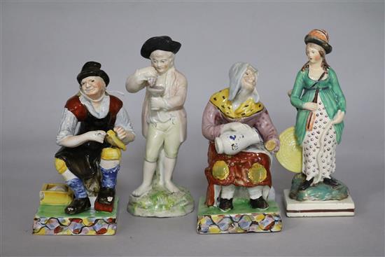 A pair of Staffordshire figures - The Cobbler and his Wife, and two other figures (4)